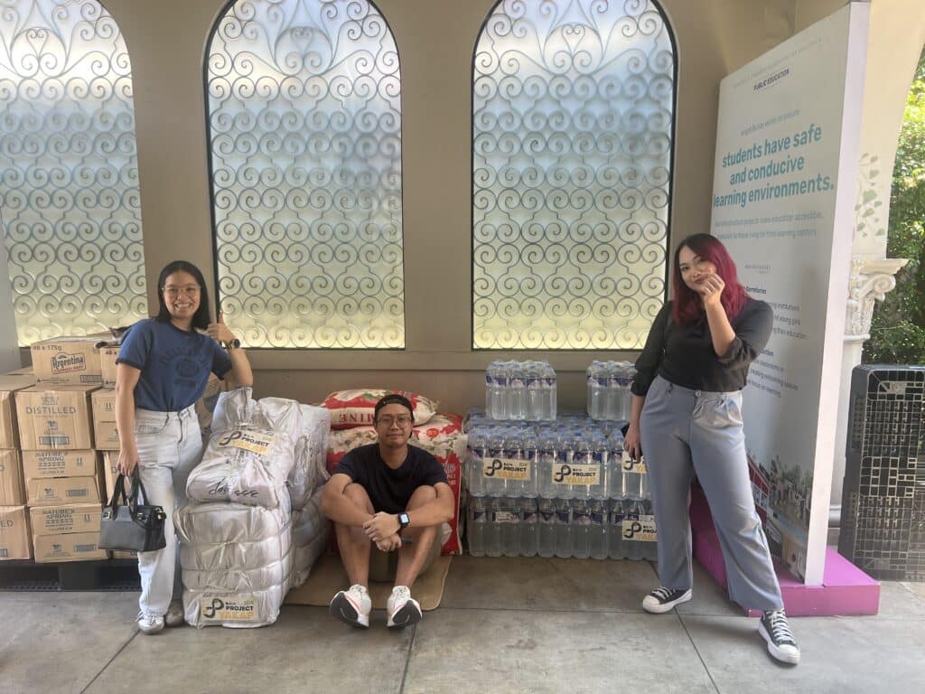 The ID8 Team Turns Over Donations